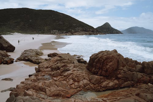 Brown Rock Formation on Seashore