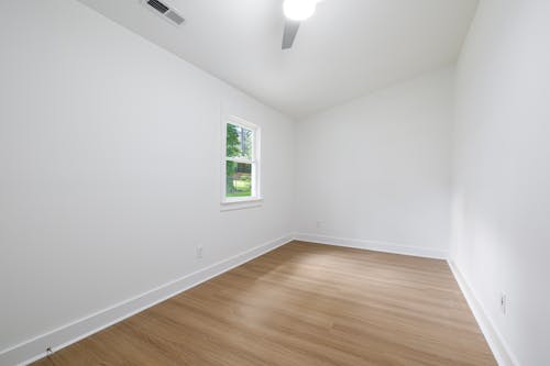 Single Window in a Room with White Walls