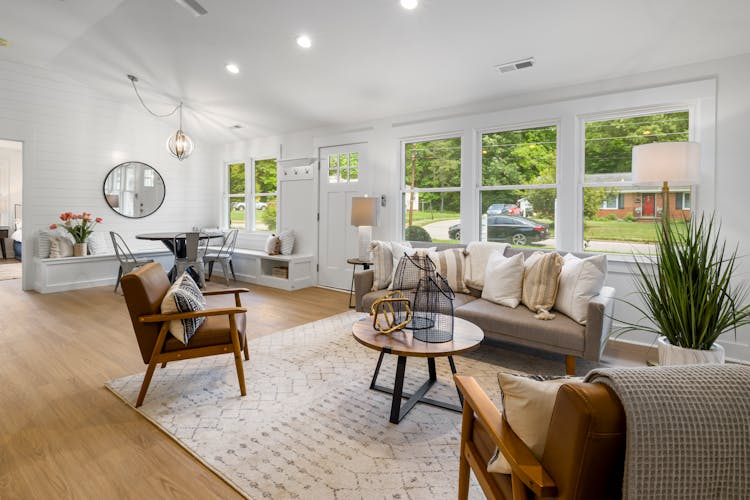 A Contemporary Living Room With Curtainless Windows