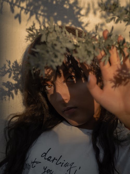 Leaves Near a Woman's Face