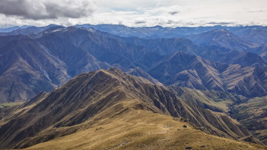 Stunning Mt. Cook Private Day Trip From Queenstown with Lake Tekapo Review 2026 - A breathtaking view of the rugged mountains near Queenstown, New Zealand, under a pristine sky.