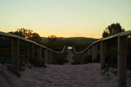 Photo of Wooden Fence on Sand