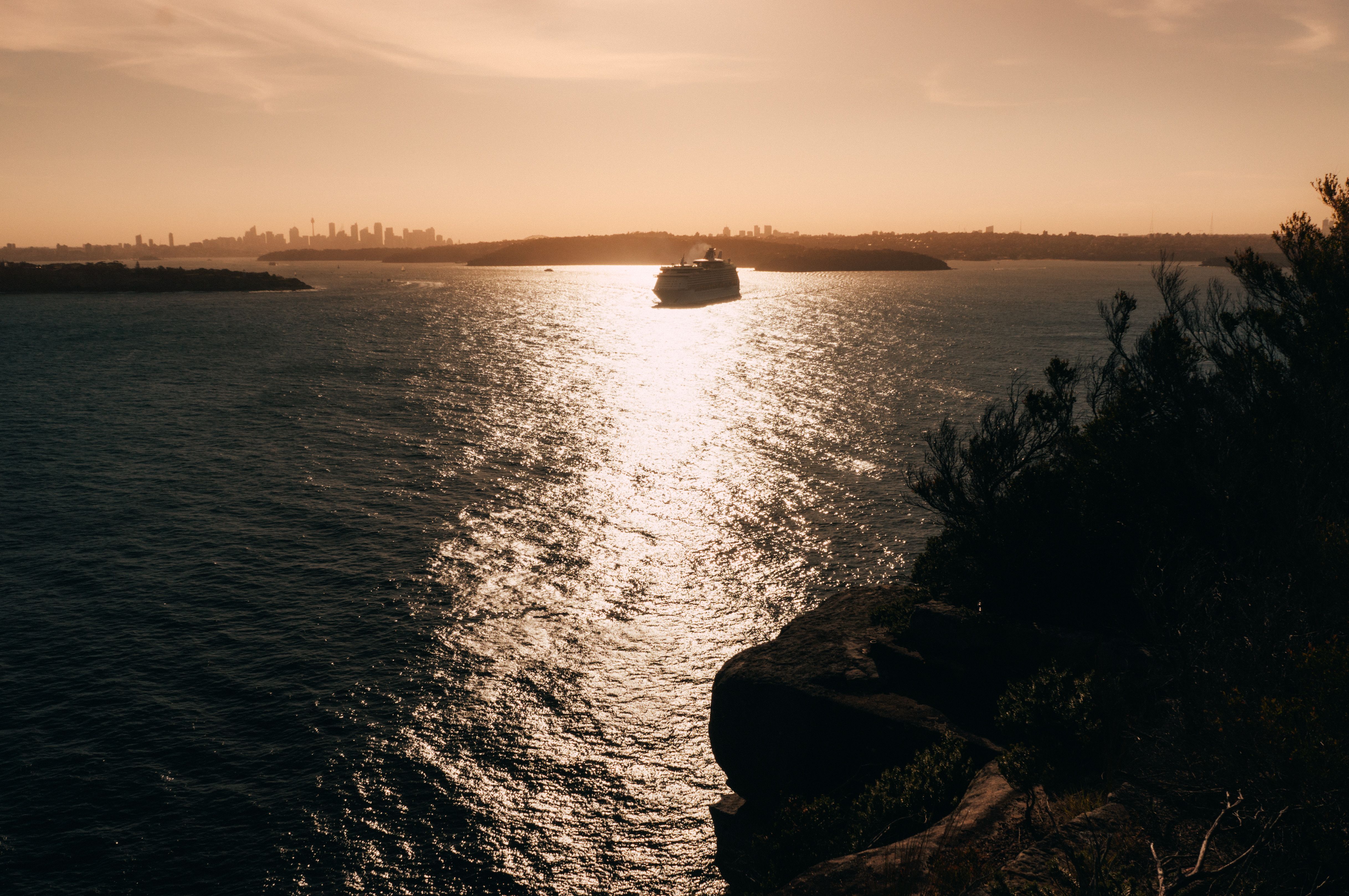 Silhouette of Cruise Ship on Water During Sunset · Free Stock Photo