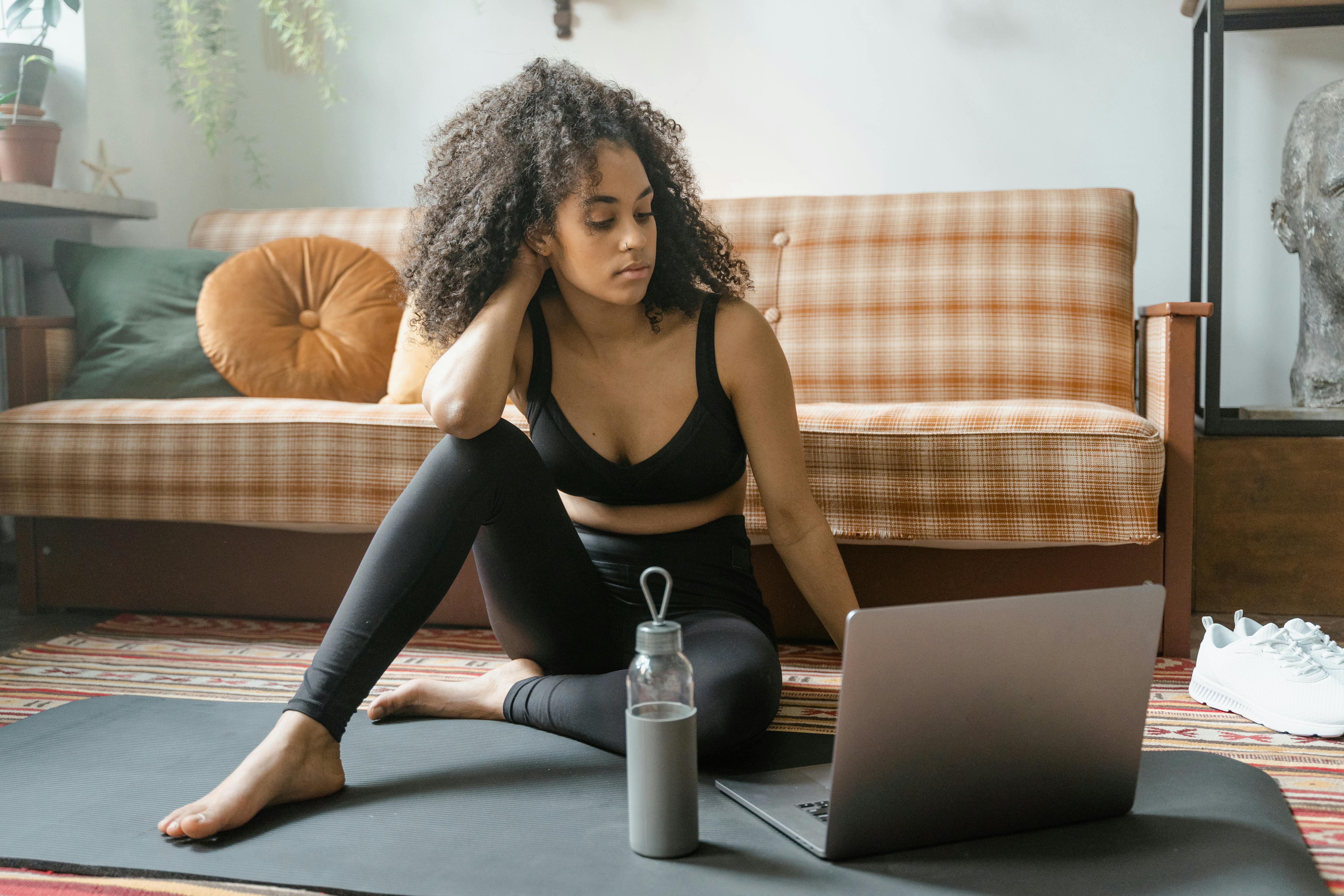 woman watching video on laptop