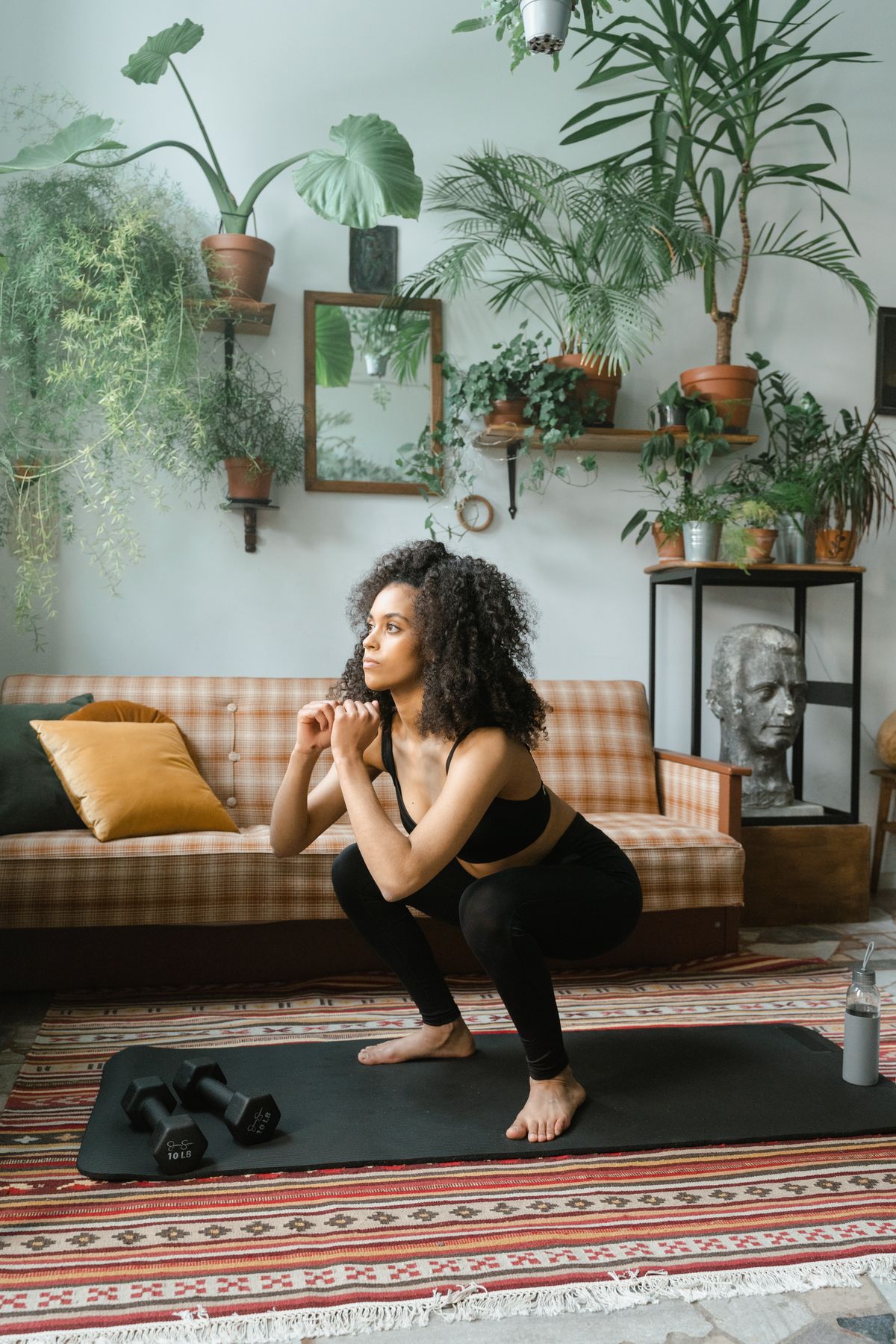 A person exercising on a mat at home