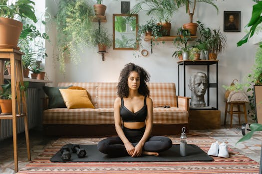 Serene yoga session at home with plants creating a calming ambiance.
