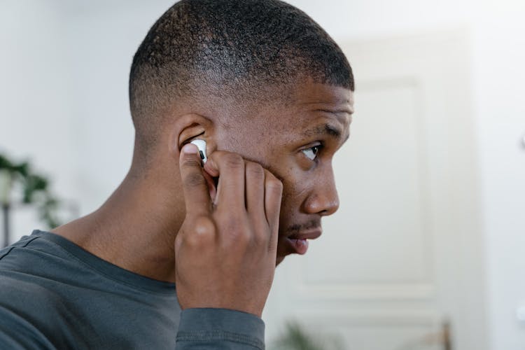 Photo Of A Man Wearing Airpods