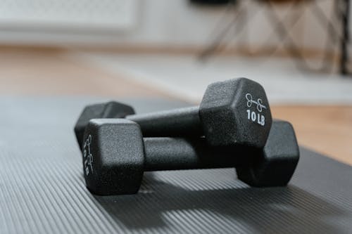 Free Close Up Photo of Black Dumbbells Stock Photo