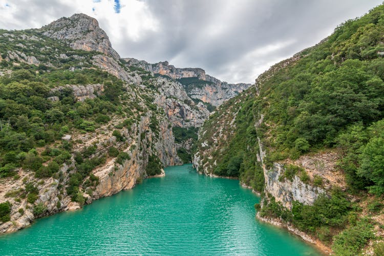 River In The Middle Of Mountains