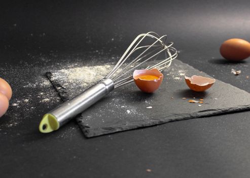 Cracked Egg and a Whisk