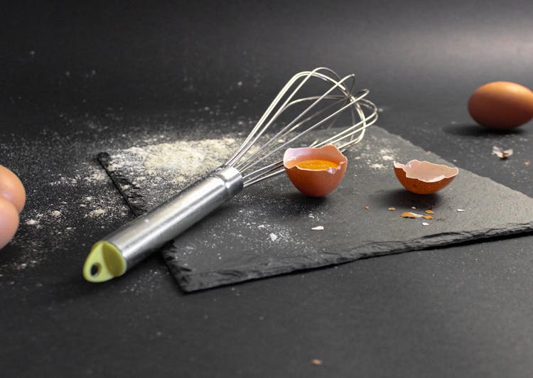 Cracked Egg And A Whisk