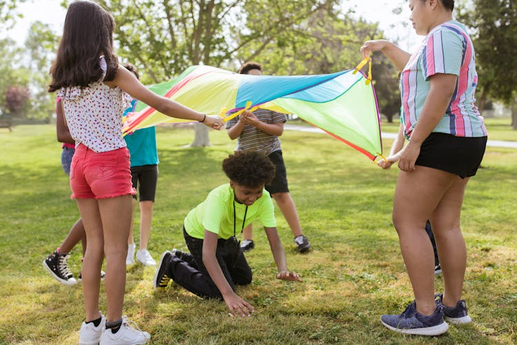 Children Playing At A Park