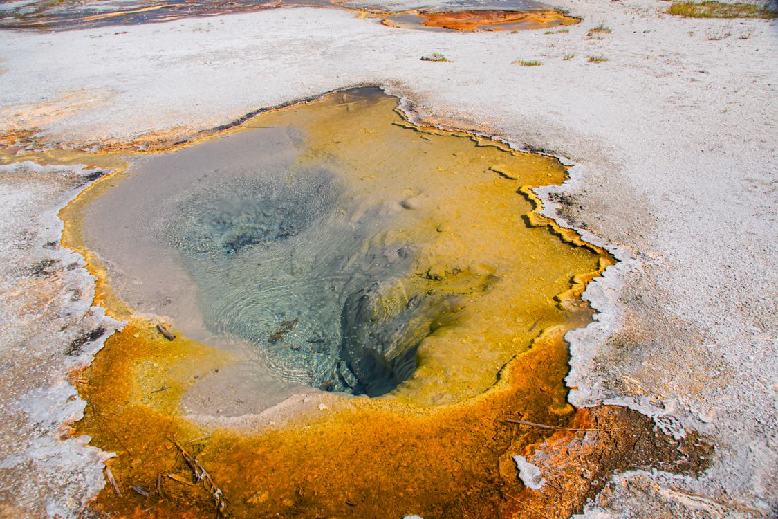 Yellowstone Hot Spring Rocks Hot Spring in Yellowstone National Park · Free Stock Photo