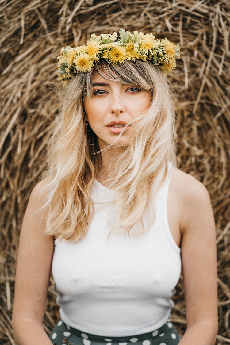 Young Woman With Flower Wreath On Head