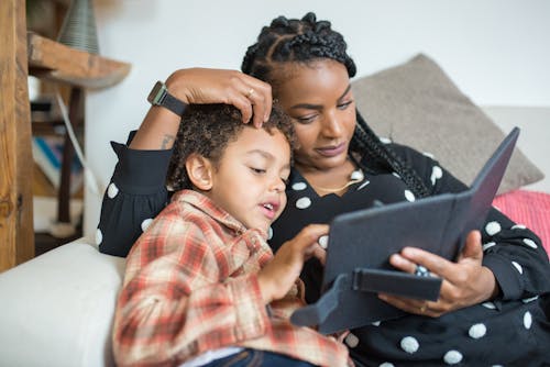 Mother and Son Using a Digital Tablet