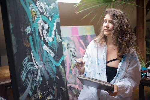 Free Photo of a Woman Painting Stock Photo