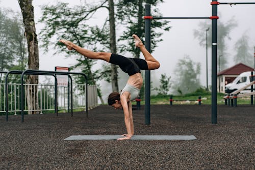 Pretty Woman Doing a Hand Stand