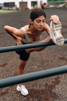 Fit woman stretching on outdoor bars, promoting healthy lifestyle and wellness.