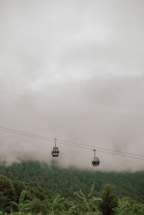 Black Cable Car Under White Clouds