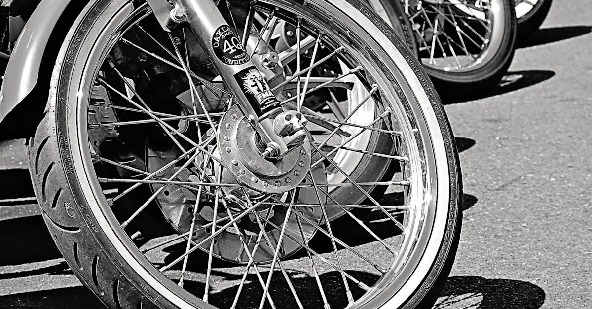 Grayscale Photo of Parked Motorcycle