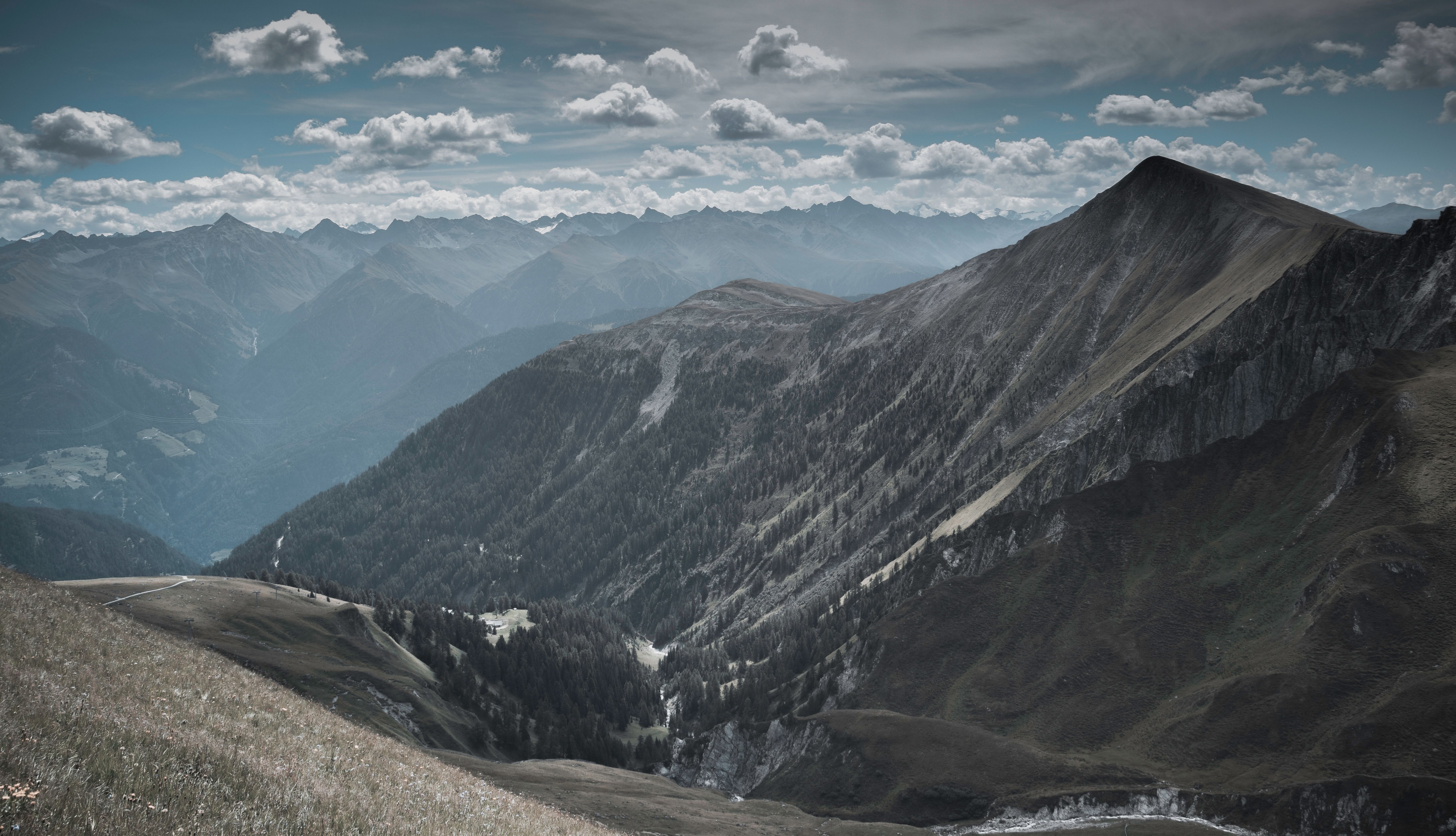 Mountain Under White Clouds at Daytime · Free Stock Photo
