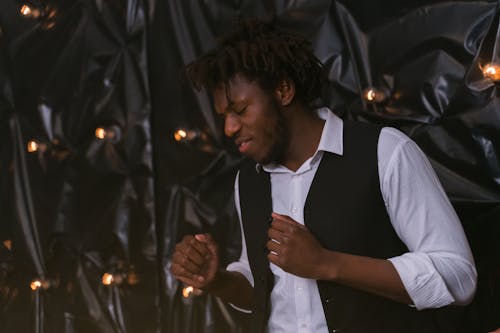 Man in Black Vest Dancing