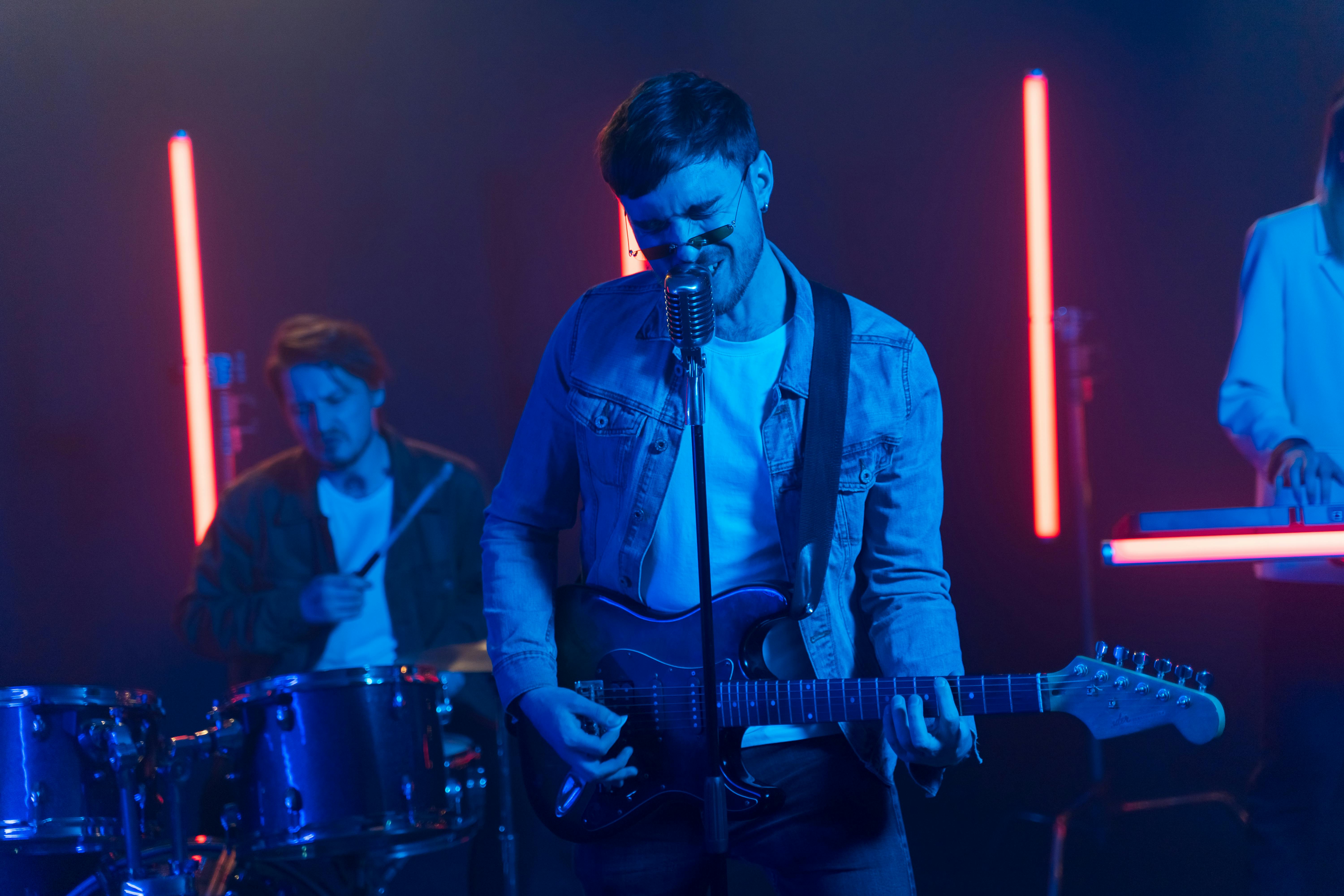 Photo of Electric Guitar and Drum Set · Free Stock Photo