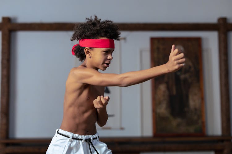 A Boy Wearing Red Headband