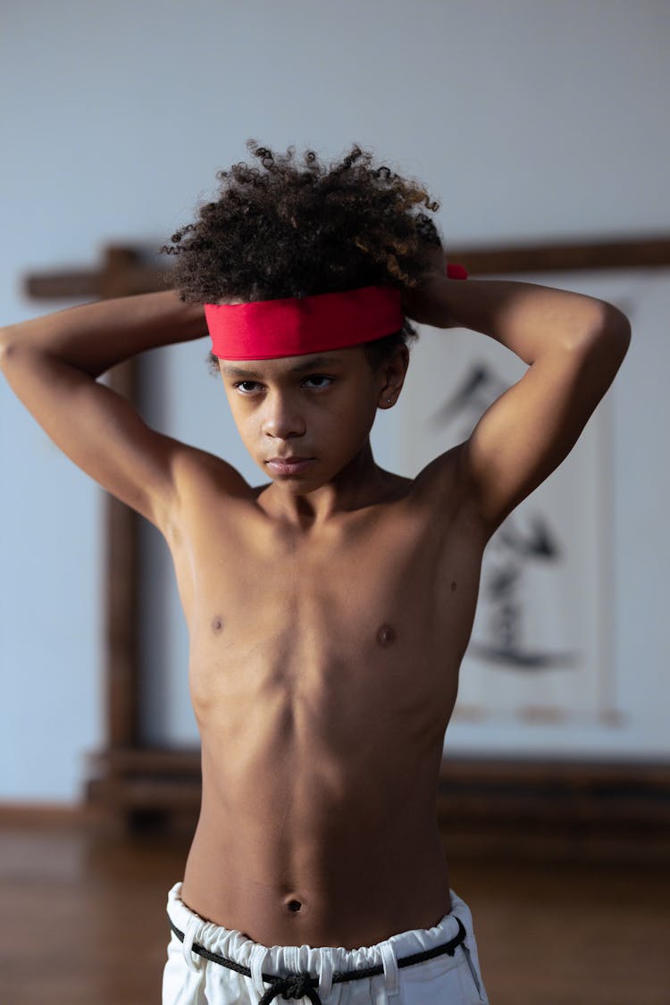 A Boy Wearing Red Headband