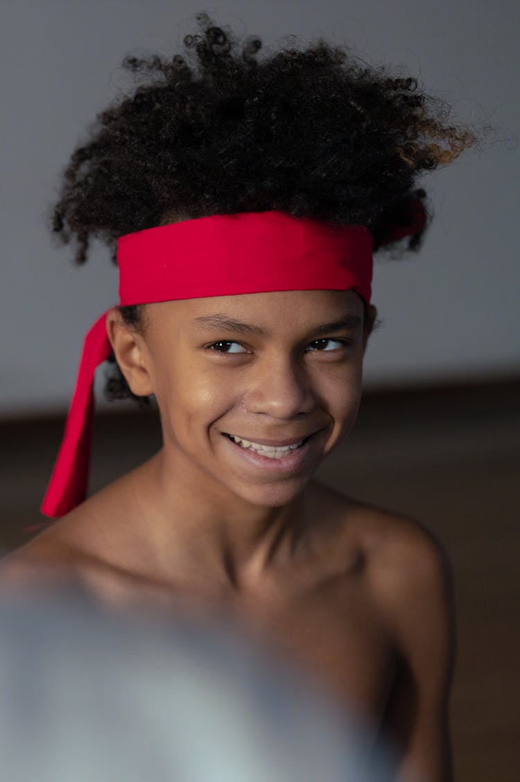 A Boy Wearing Red Headband