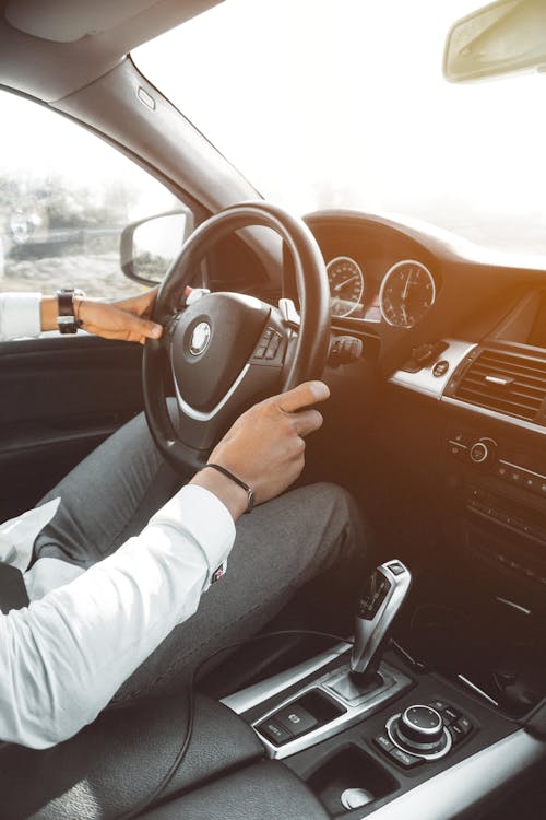 Free Person drives a Luxurious Car Stock Photo