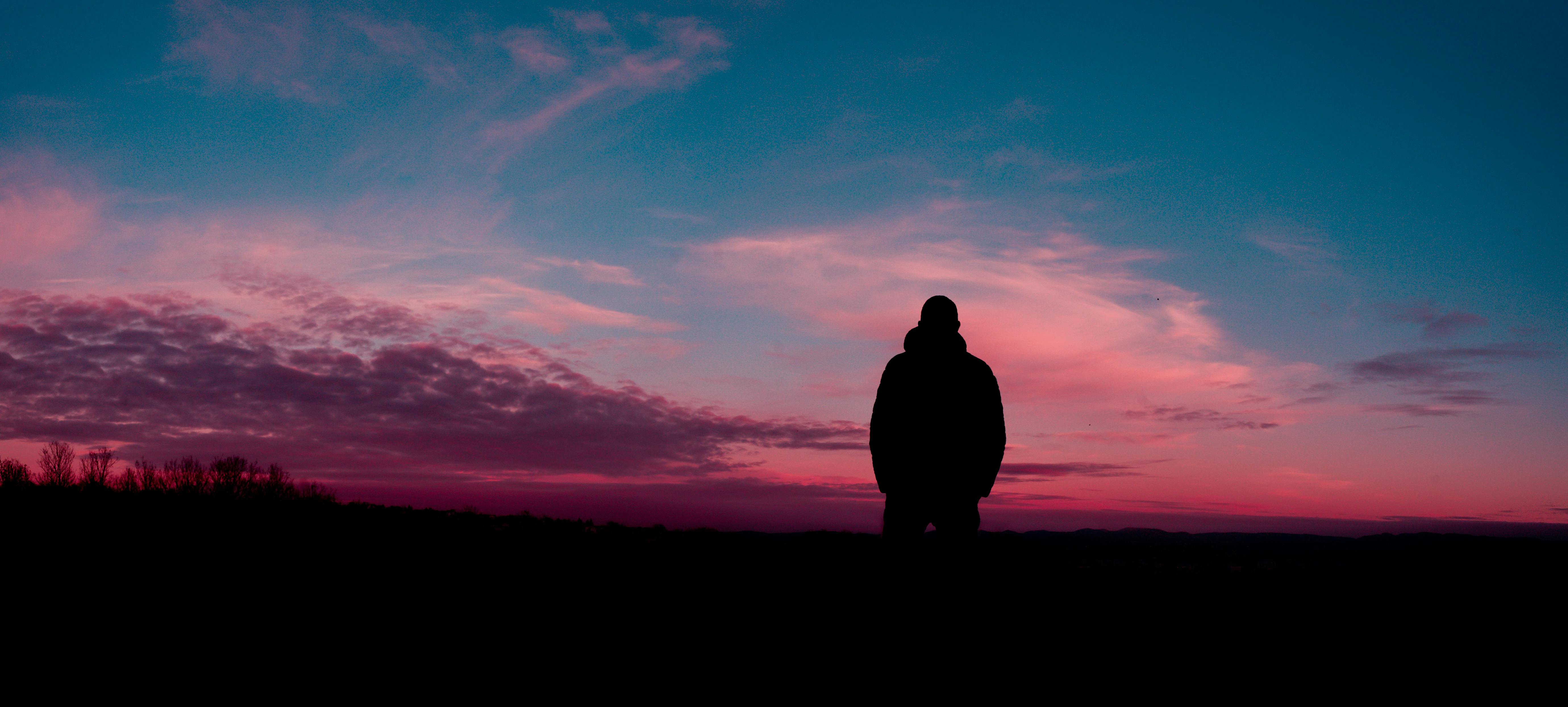 Silhouette Of Human With Sunset Background Free Stock Photo