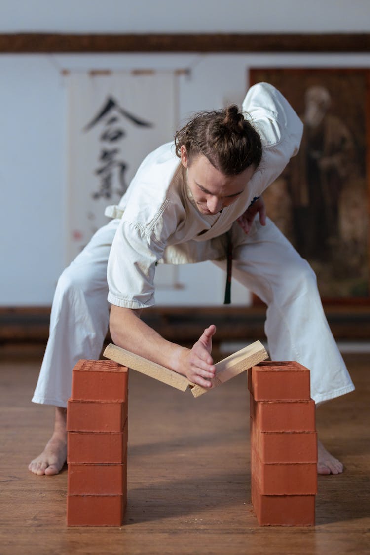 Man Breaking A Board