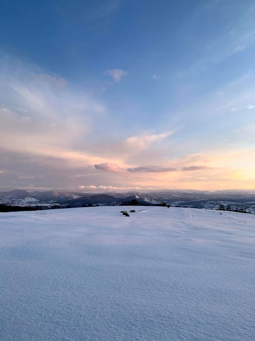Kostenloses Stock Foto zu landschaft, moody himmel, schnee