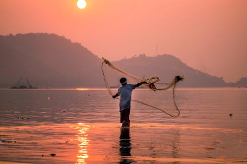 Δωρεάν στοκ φωτογραφιών με αλιεία, Ανατολή ηλίου, άνδρας Φωτογραφία από στοκ φωτογραφιών