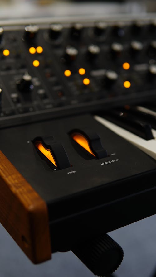 Free Selective Focus Photo of Control Buttons of a Synthesizer Stock Photo