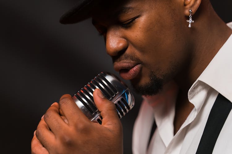 Close Up Photo Of A Man Singing