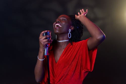 A Woman Singing Cheerfully
