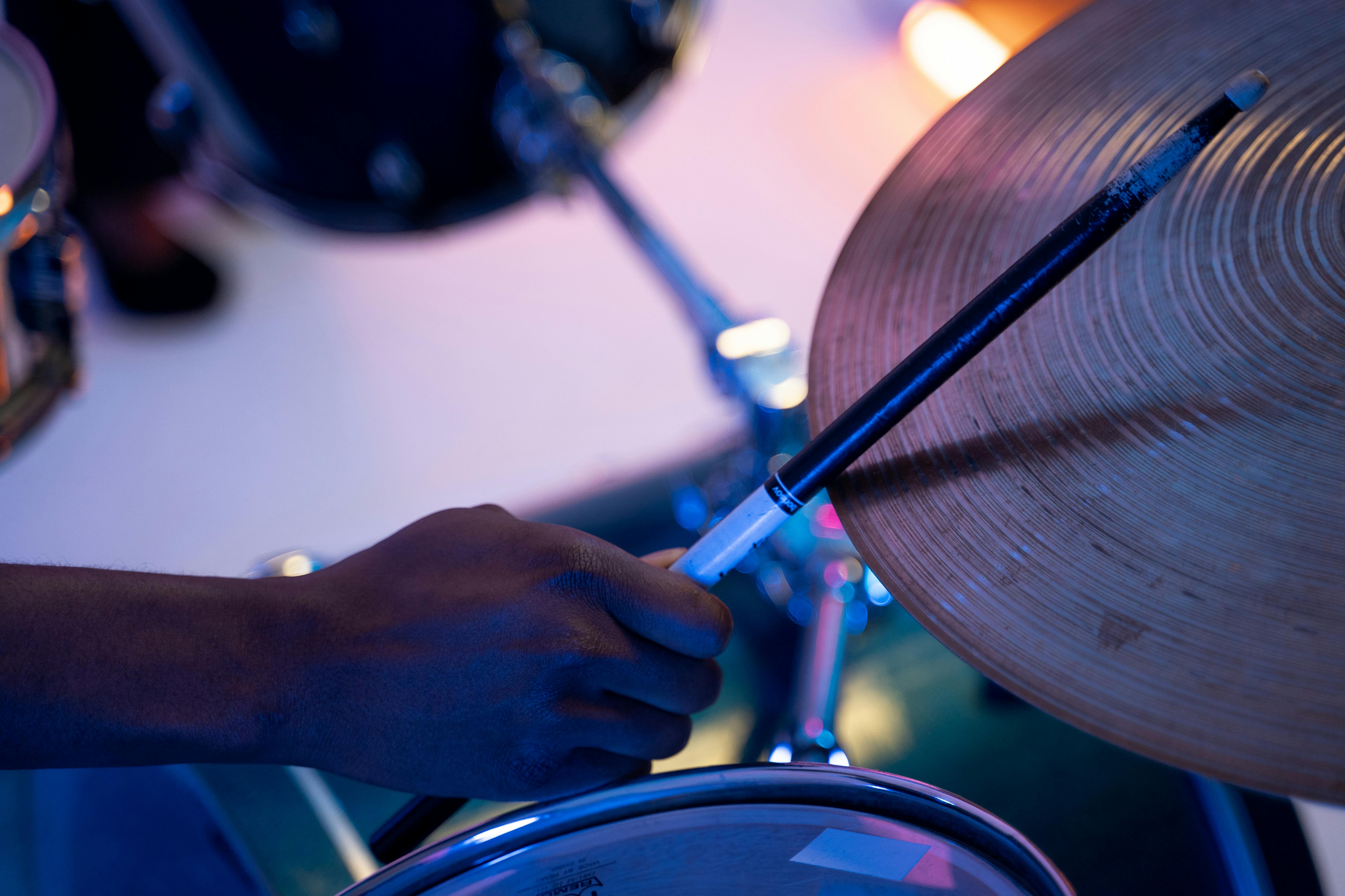 close up of holding a drumstick