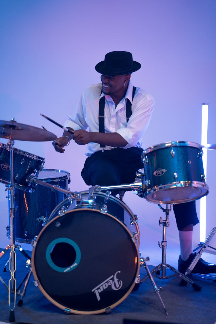 A Man Playing The Drums 