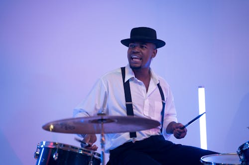 A Man Playing Drums