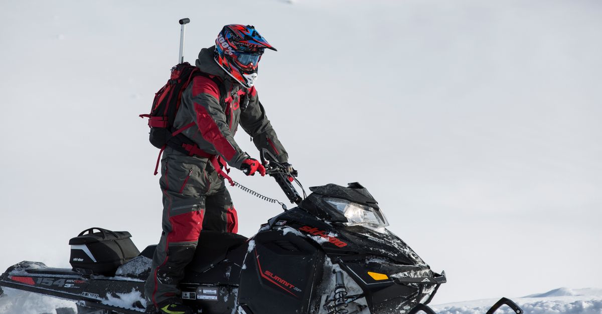 Person Riding on Snowmobile · Free Stock Photo