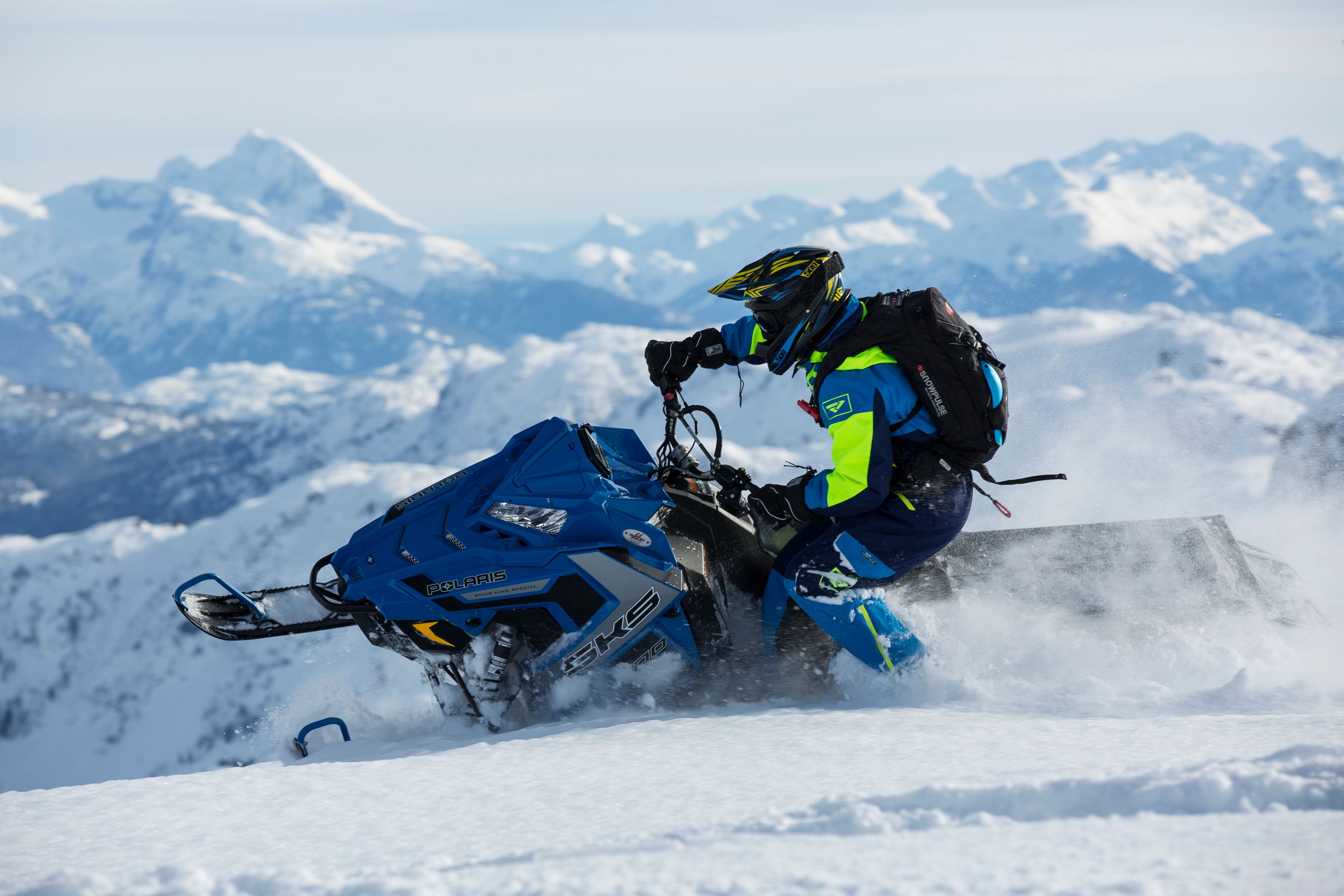 Man In Blue And Green Long-sleeved Suit Riding On Snowmobile · Free ...