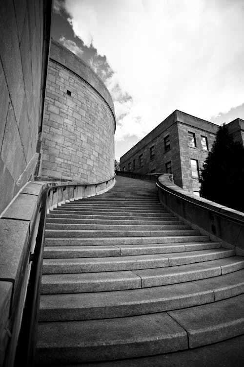 Grayscale Photography of Concrete Stairs