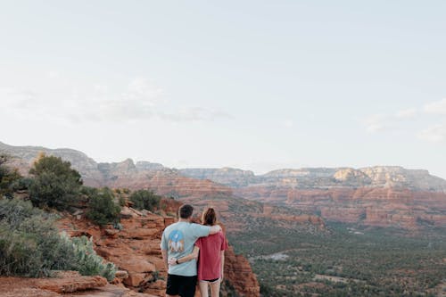 A Couple Standing on the Rocky Mountain