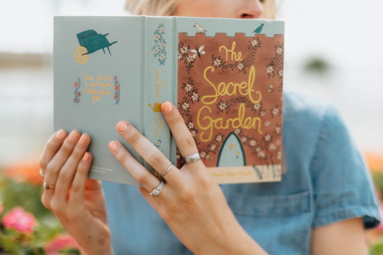 Person Holding A Book