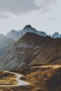 Brown and Gray Mountains Under White Sky