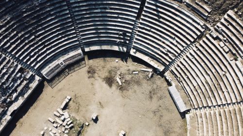 Free Overhead view of an ancient amphitheater in Aydın, Türkiye, showcasing its architectural grandeur. Stock Photo