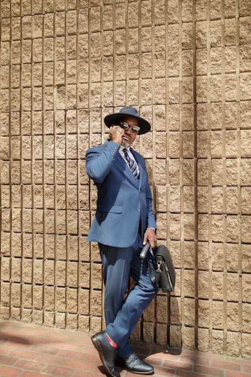 Kostnadsfri bild av affärsman, blå-suit, hatt
