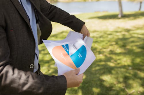 Person Holding a Document